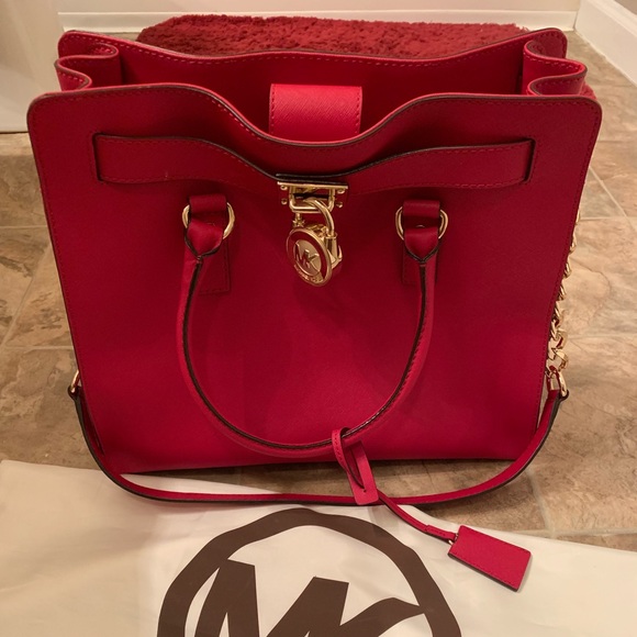 Michael Kors Other - Unused! Red Michael Kors purse w/ storage bag